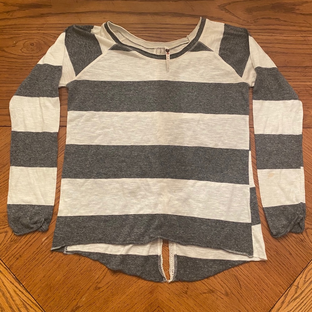 Grey and white striped shirt.